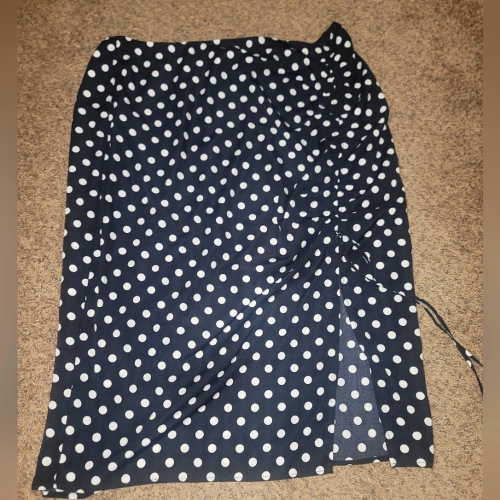 New Skirt Sugar + Lips  skirt with a cut to the side of the knee has an adjustab